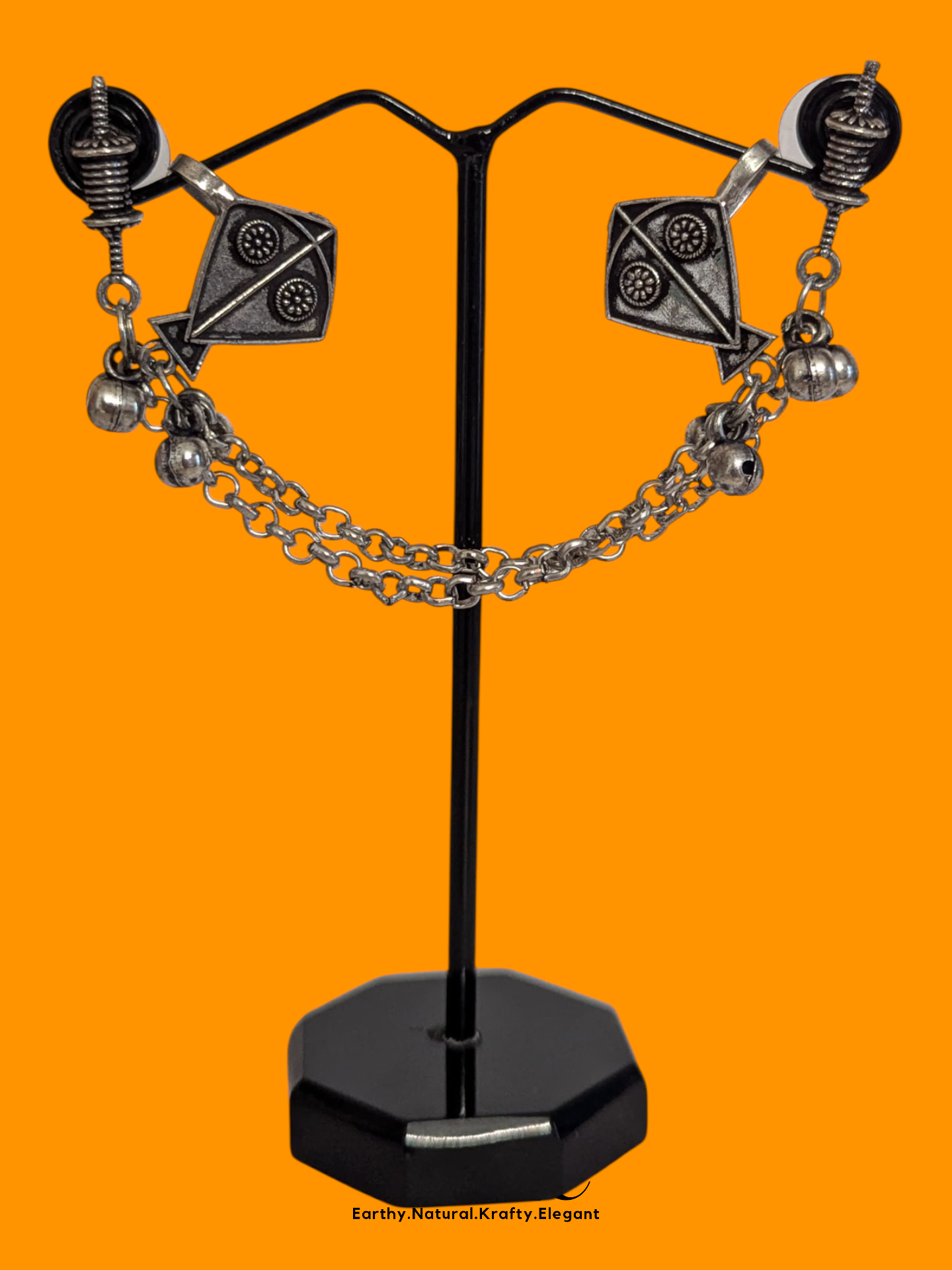 Intricately Designed Silver Kite Cuff with Delicate Chain Links and Decorative Bells