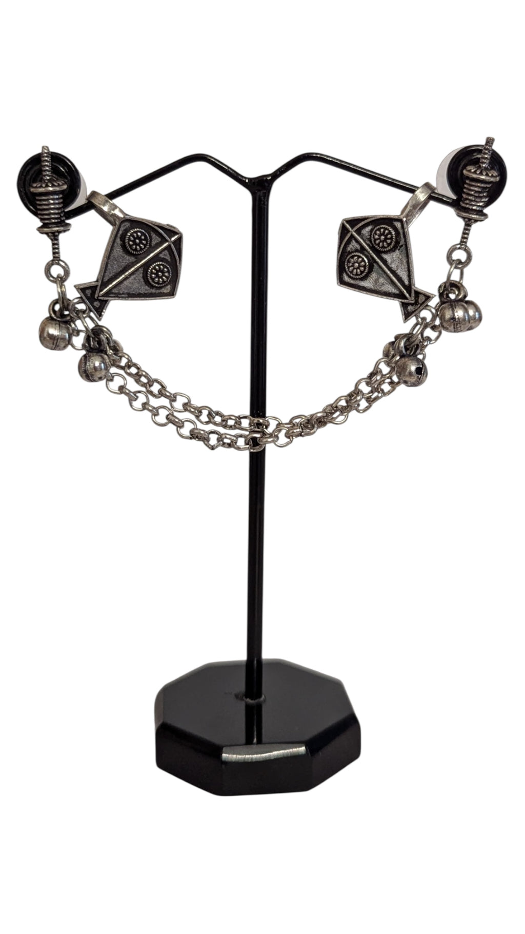 Intricately Designed Silver Kite Cuff with Delicate Chain Links and Decorative Bells