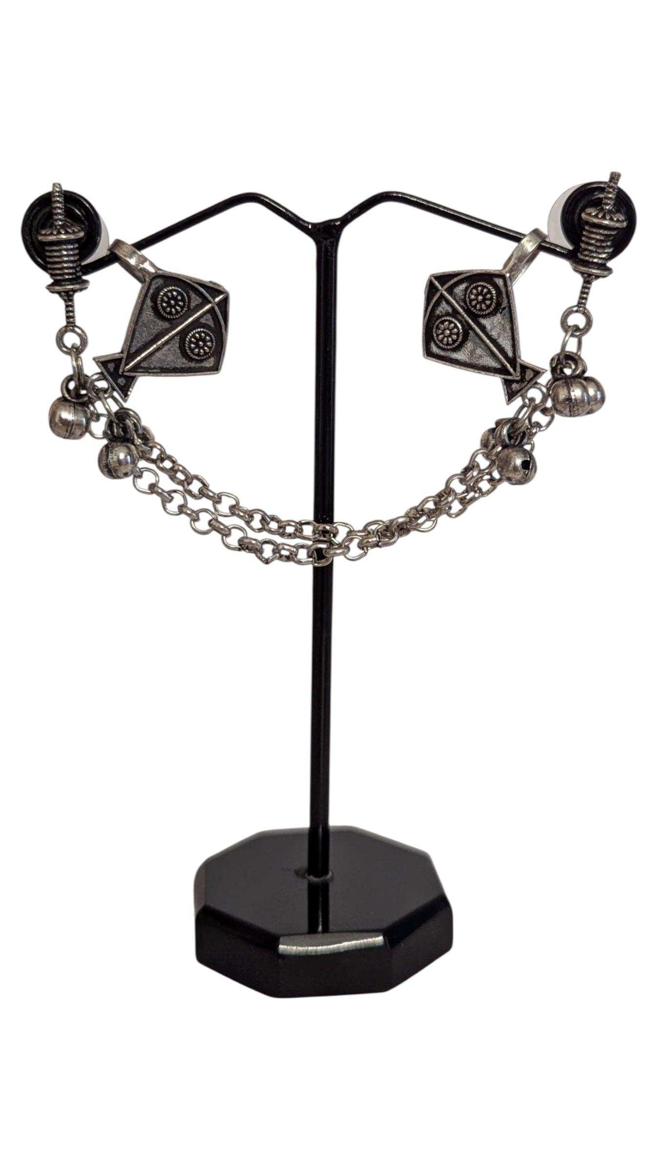 Intricately Designed Silver Kite Cuff with Delicate Chain Links and Decorative Bells