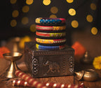 Vibrant Handcrafted Fabric Bangle with Ethnic Charms